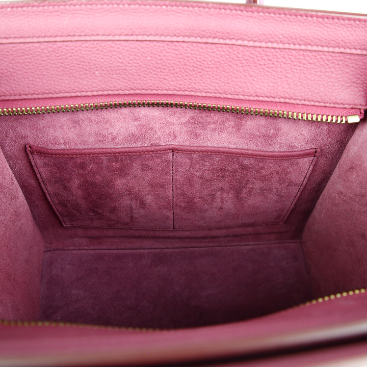 Interior pocket view of Celine Berry Baby Drummed Clafksin Leather Micro Luggage
