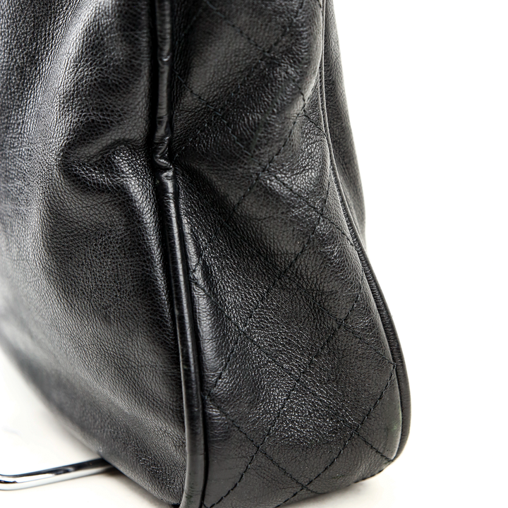 side view of Chanel Black Calfskin Coco Curve Hobo