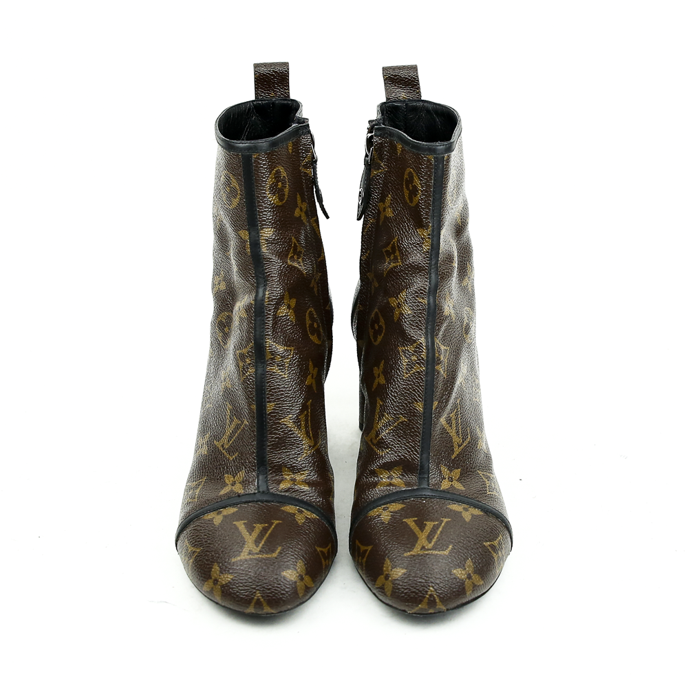 front view of Louis Vuitton Monogram Canvas New Revival Ankle Boots