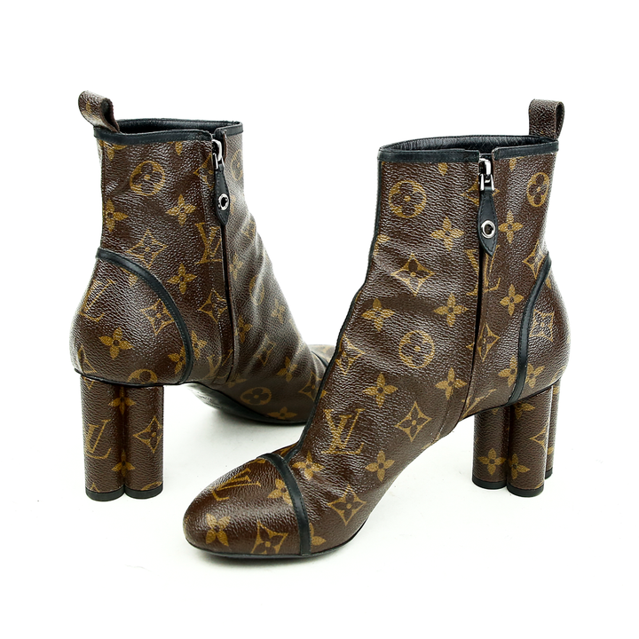 side zip view of Louis Vuitton Monogram Canvas New Revival Ankle Boots