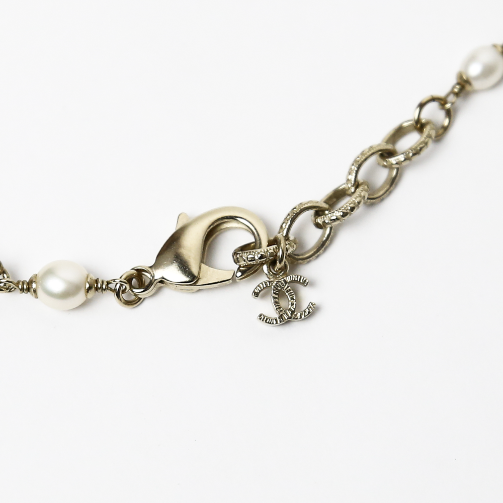 clasp view of Chanel Strass & Enamel Pearl Station Necklace