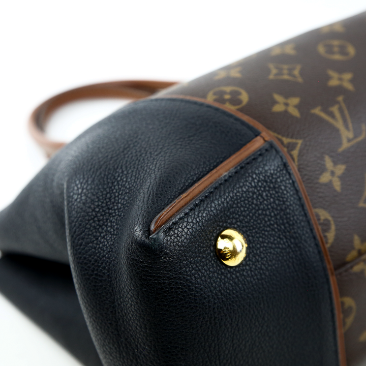 corner view of Louis Vuitton Monogram Canvas & Black Leather W PM Bag
