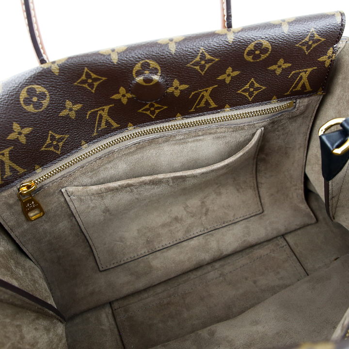 interior view of Louis Vuitton Monogram Canvas & Black Leather W PM Bag