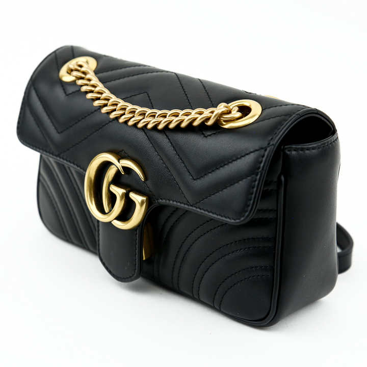 side view of Gucci Black GG Marmont Mini Matelasse Shoulder Bag