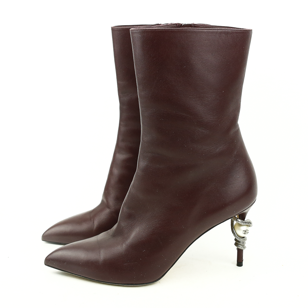 side view of Chanel Burgundy Leather Runway Pearl Boots