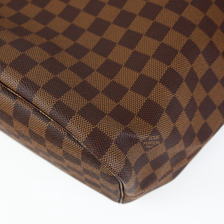 corner view of Louis Vuitton Damier Ebene Neverfull MM