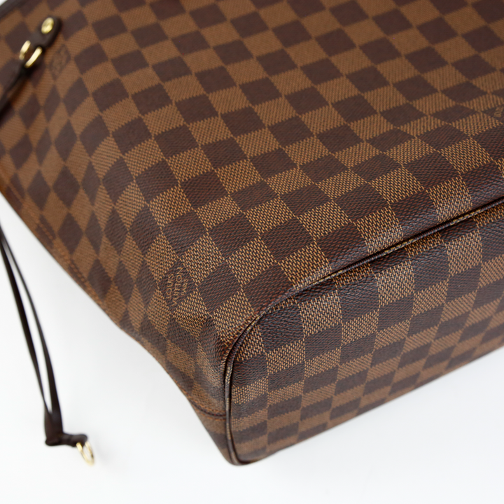 corner view of Louis Vuitton Damier Ebene Neverfull MM