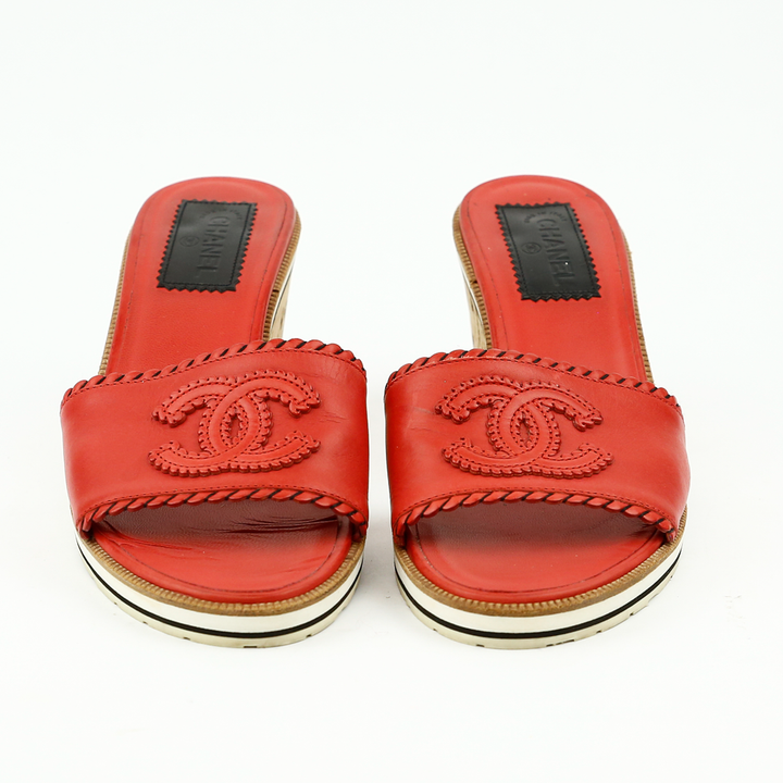 front view of Chanel Red Leather CC Cork Wedge Slides