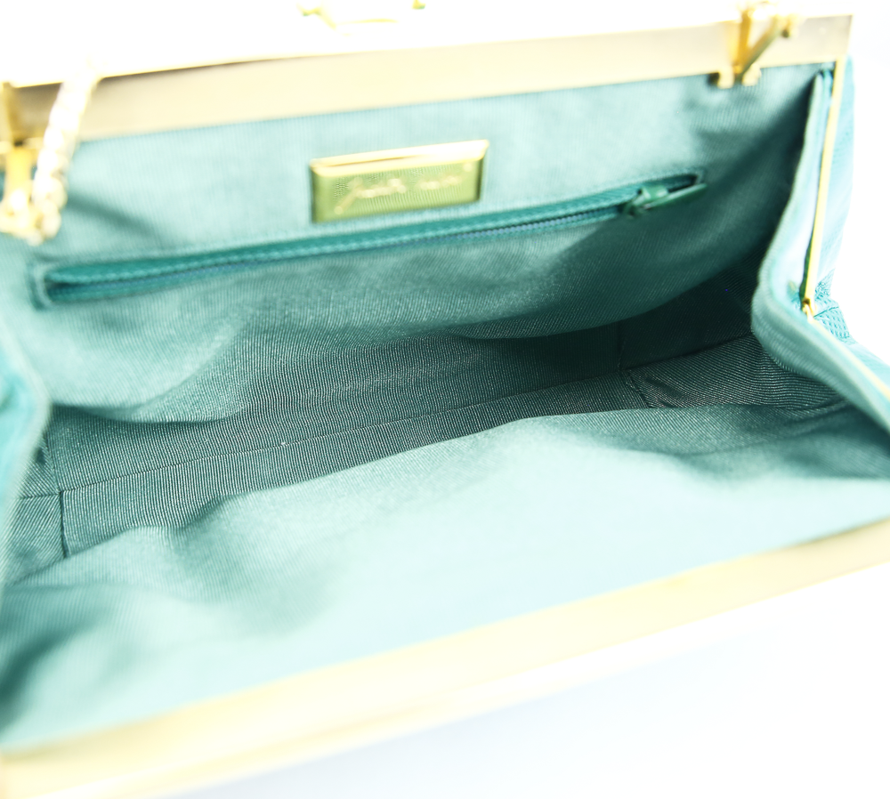 interior view of Judith Leiber Vintage Green Frame Clutch