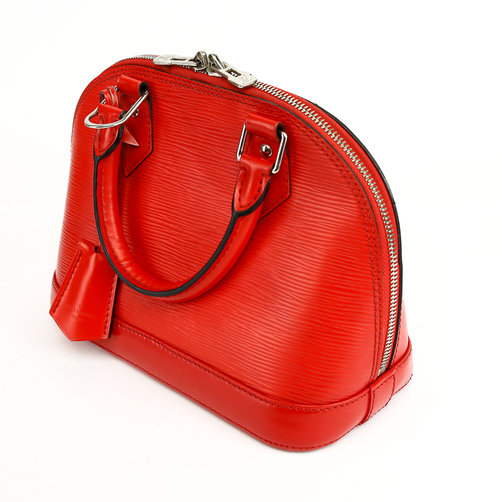 side view of Louis Vuitton Red Epi Leather Alma BB