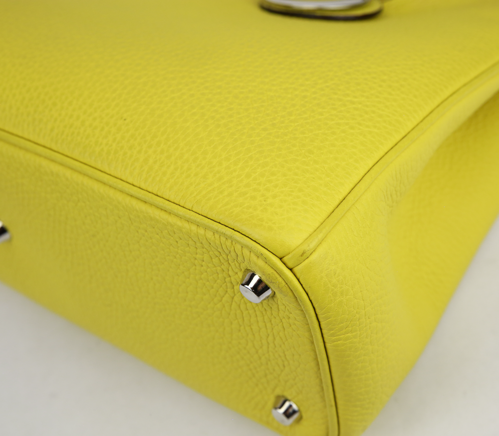 corner view of Dior Yellow Pebbled Leather Diorissimo Tote Bag