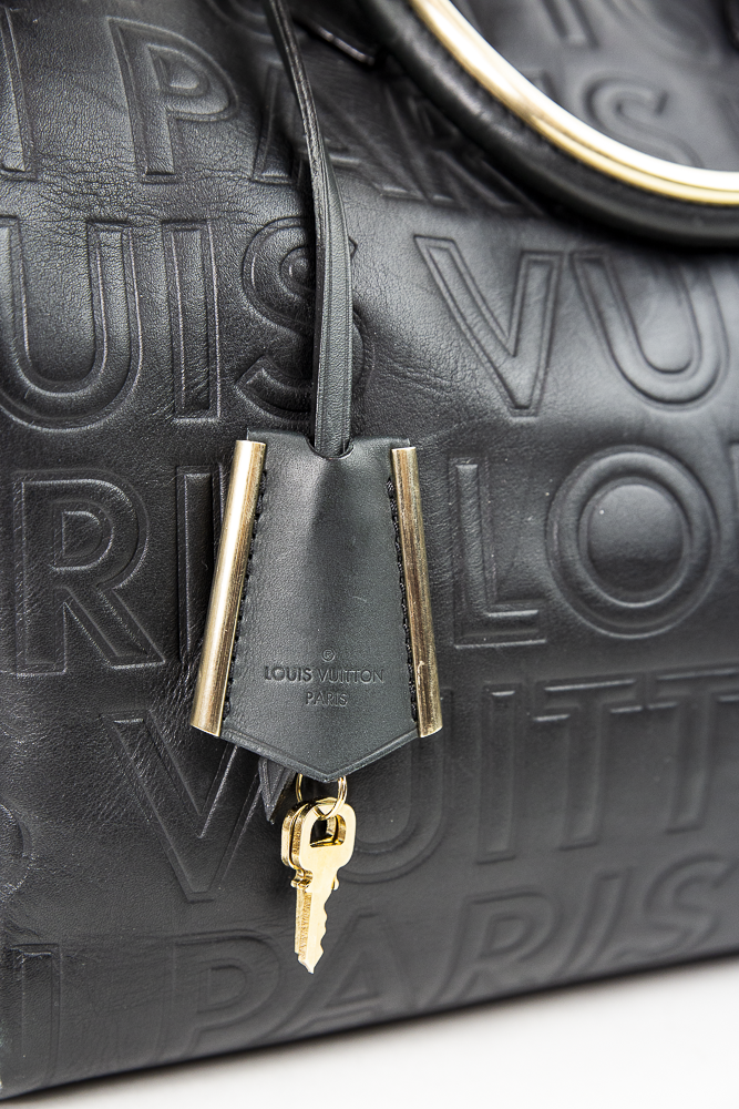 Lock view of Louis Vuitton Speedy Cube 30 Black Calfskin Embossed Leather Satchel