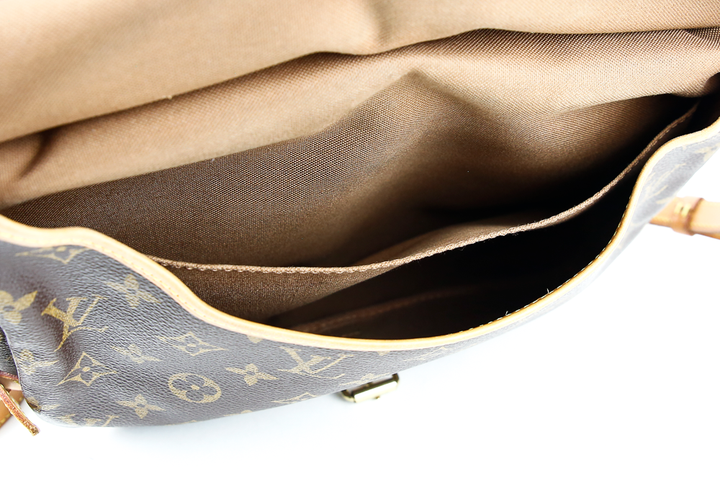 interior view of Louis Vuitton Monogram Coated Canvas Saumur 25 Satchel