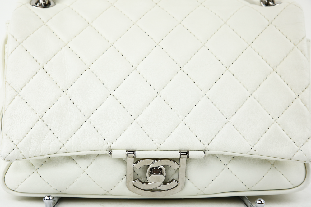 turnlock view of Chanel Icons Secret Label Ivory Leather Shoulder Bag