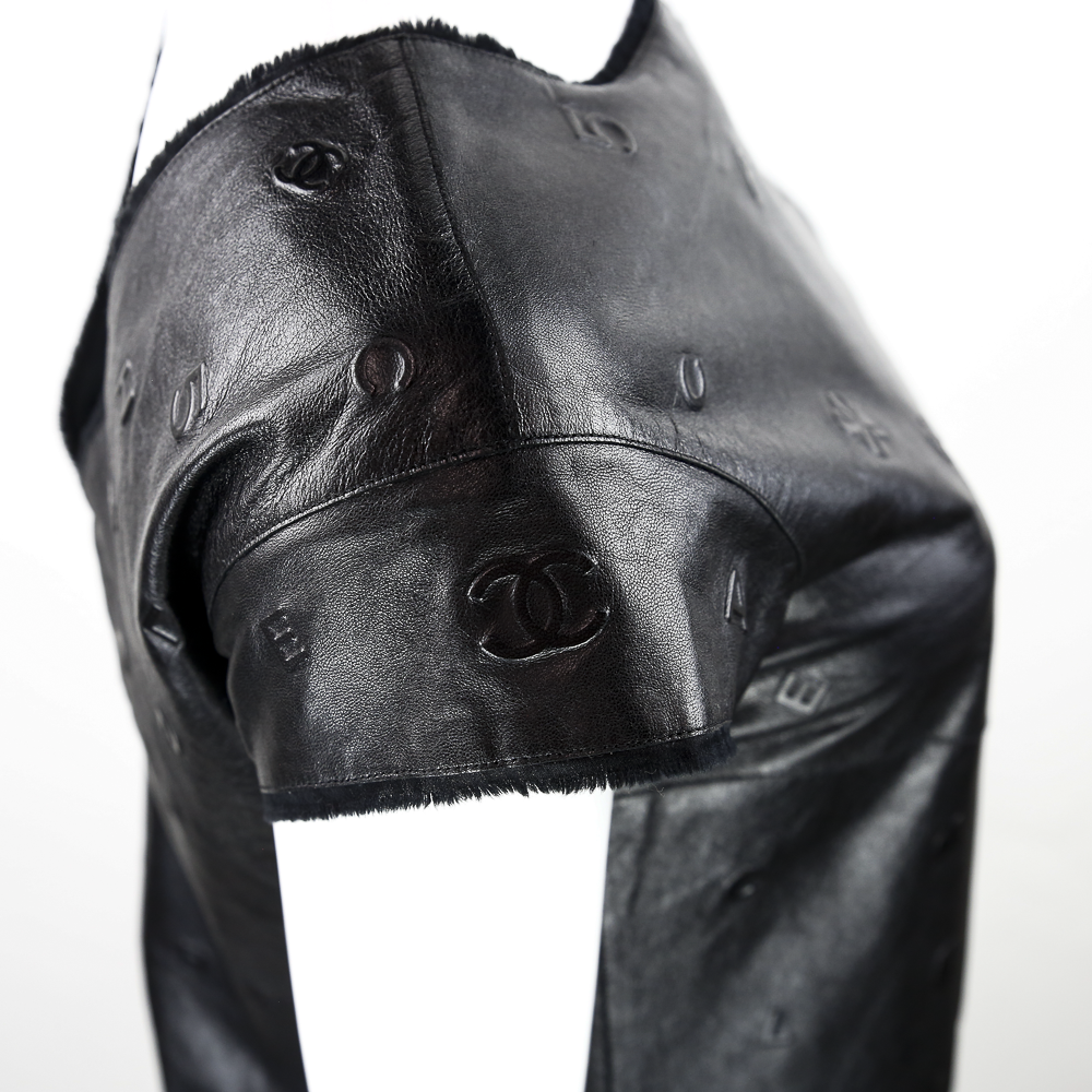 shoulder view of Chanel Black Lambskin Leather Cap Sleeve Midi Dress