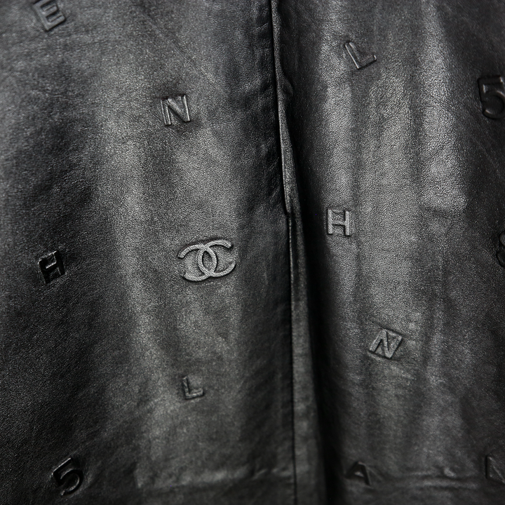 detail view of Chanel Black Lambskin Leather Cap Sleeve Midi Dress