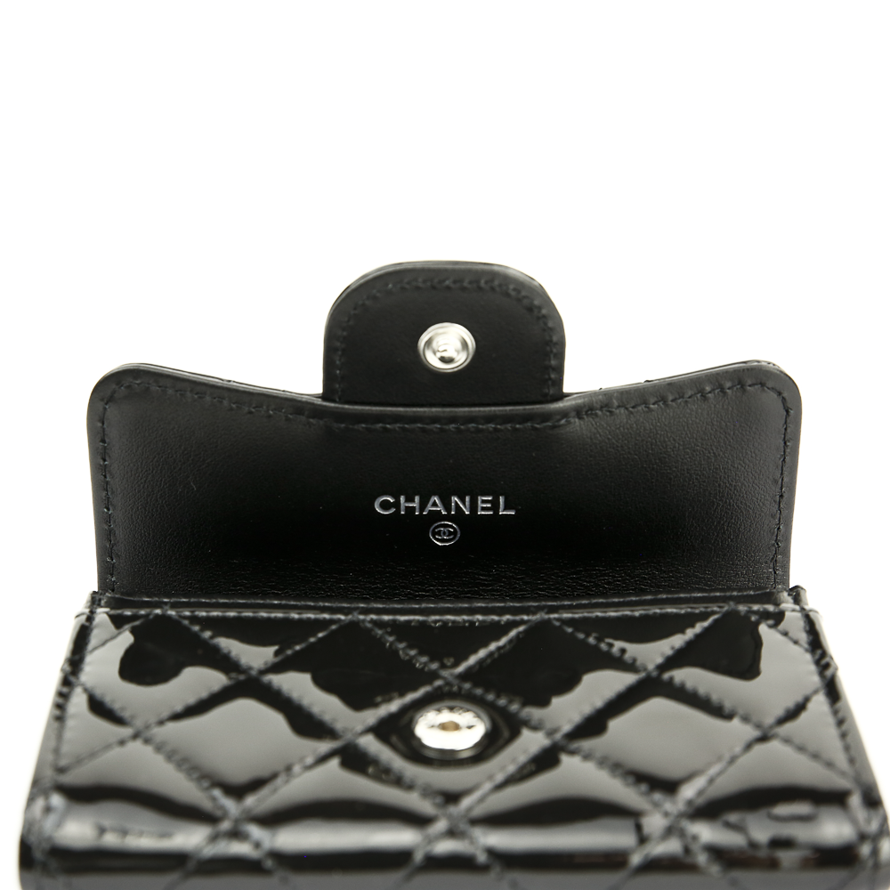 Flap view of Chanel 2.55 Reissue Quilted Black Patent Leather Card Holder