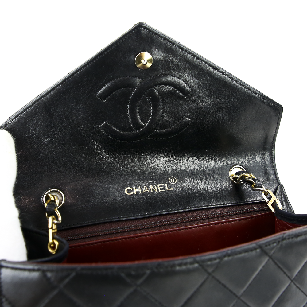 Interior flap view of Chanel Vintage Black Quilted Envelope Flap Bag