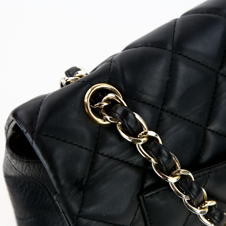 hardware view of Chanel Black Lambskin Single Flap Maxi Handbag