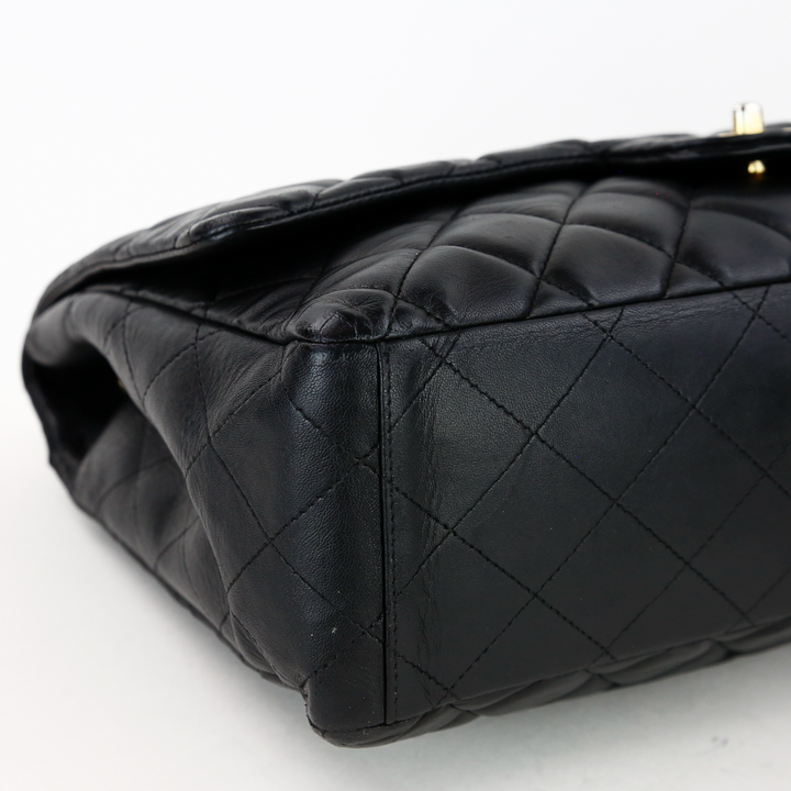 corner view of Chanel Black Lambskin Single Flap Maxi Handbag