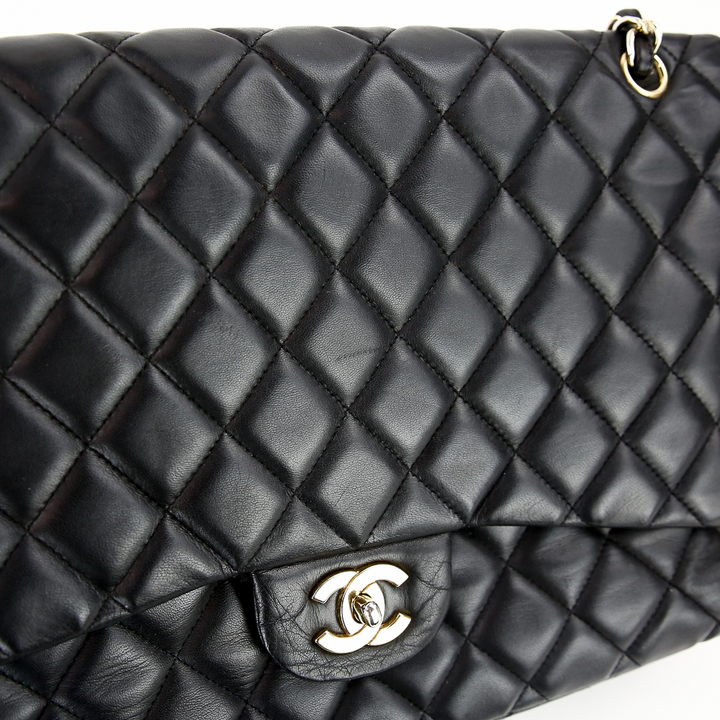 Front flap view of Chanel Black Lambskin Single Flap Maxi Handbag