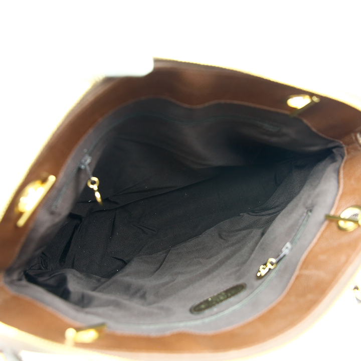 interior view of Chanel Vintage Brown Caviar Triple C Shoulder Bag