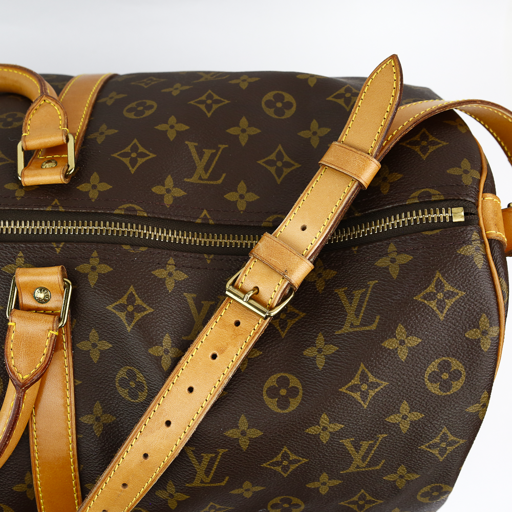 Strap view of Louis Vuitton Monogram Coated Canvas Keepall 60