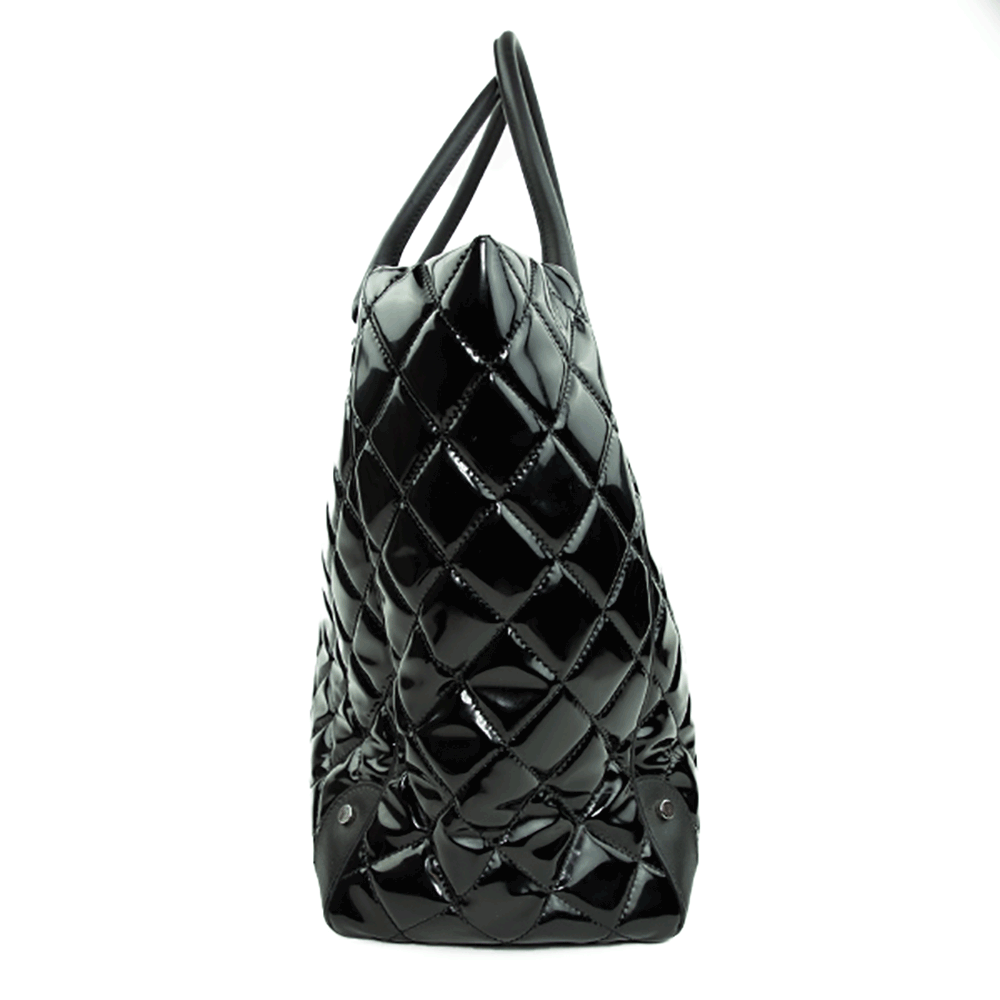 Side view of Chanel Black Quilted Patent Leather Limited Edition Travel Tote