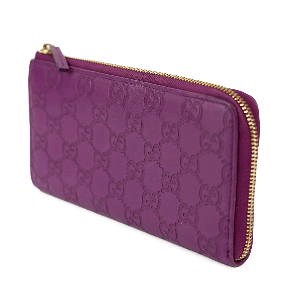 side view of Gucci Purple Guccissima Leather Bree Wallet
