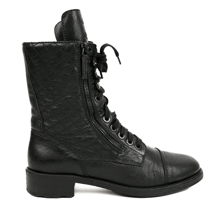 side view of Chanel Black Leather Combat Boots