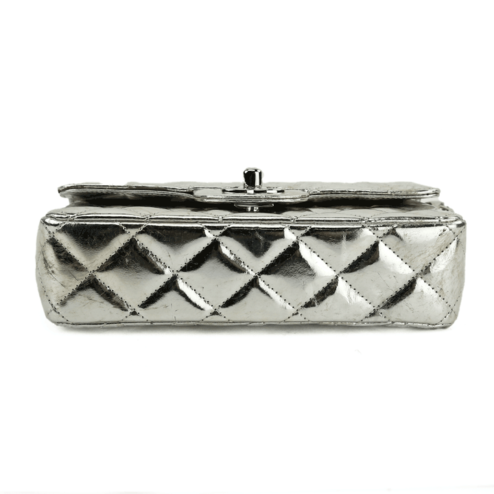 Base view of Chanel Around The World Silver Quilted Clutch