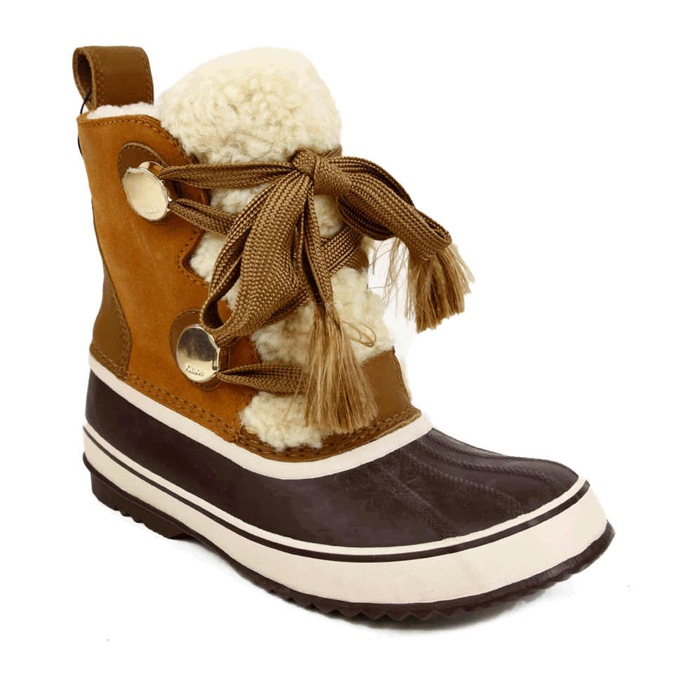 side view of Chloé x Sorel Joan Of Arc Shearling Lined Snow Boots