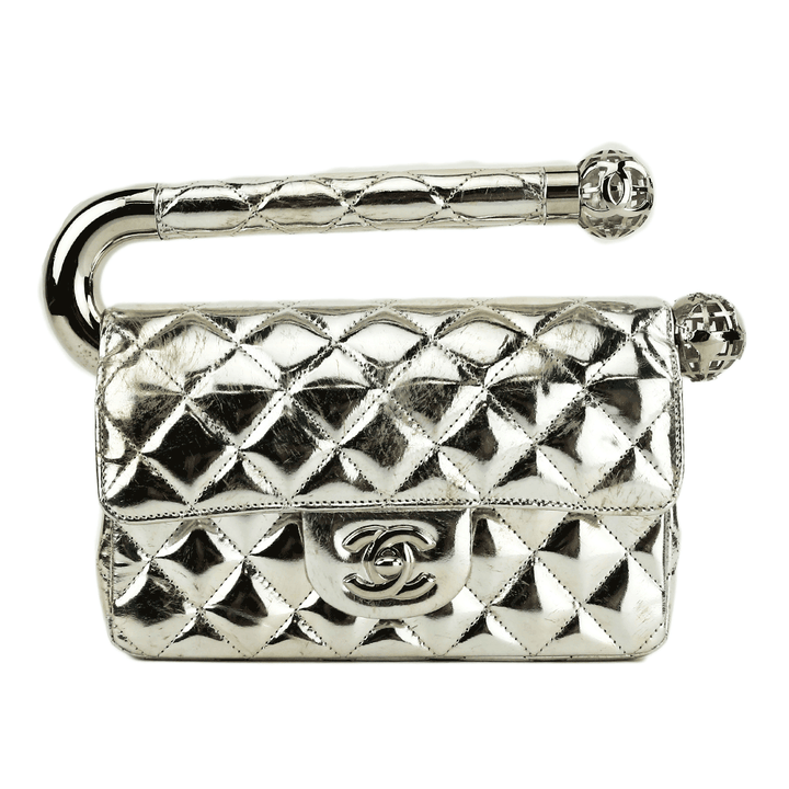 Front view of Chanel Around The World Silver Quilted Clutch
