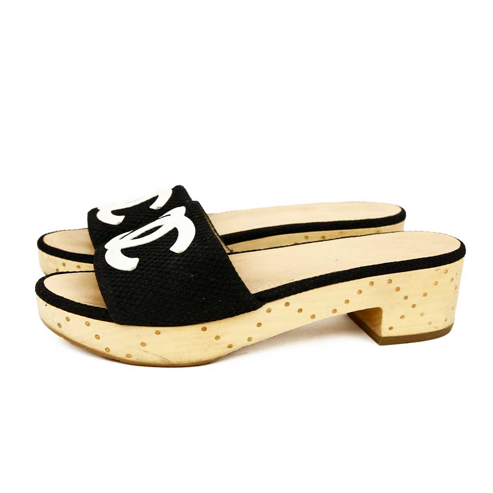 side view of Chanel Black Canvas CC Logo Wooden Slide Sandals
