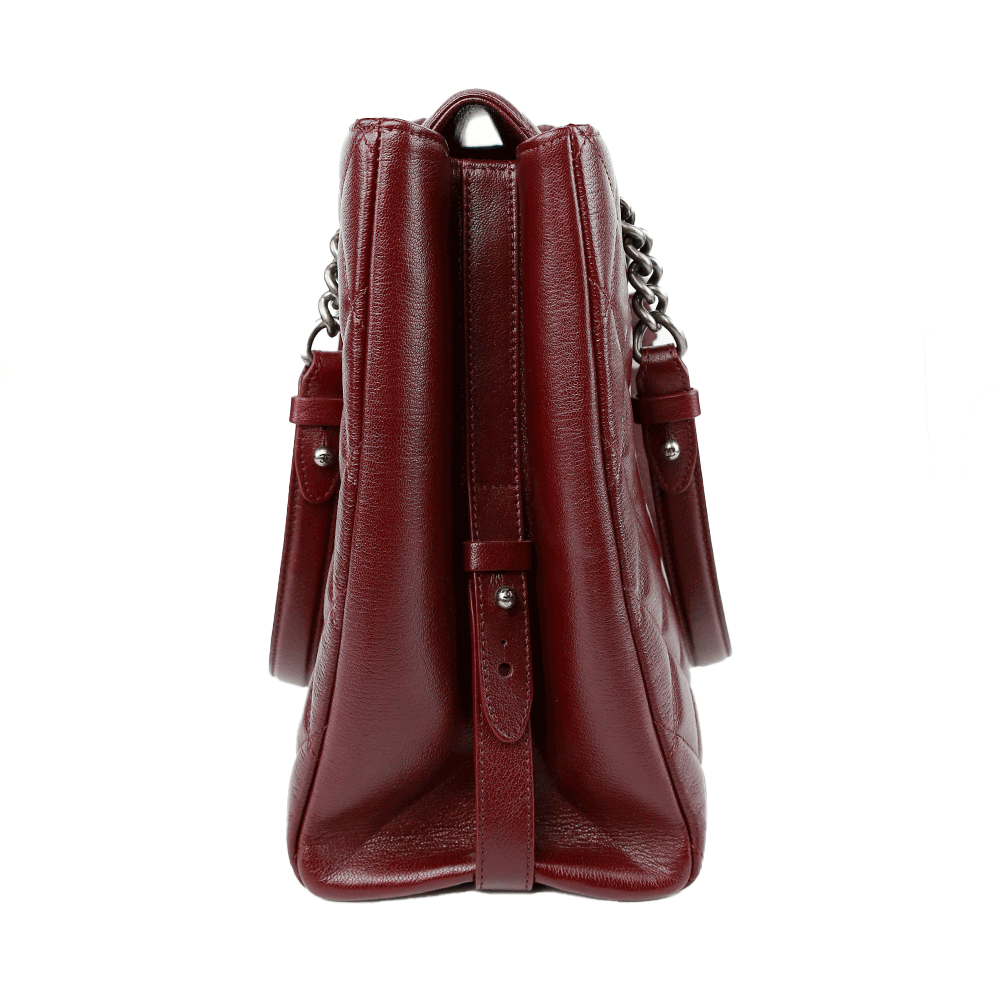 side view of Chanel Burgundy Caviar Leather Rock Shopping Tote