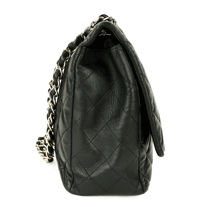 side view of Chanel Black Lambskin Single Flap Maxi Handbag