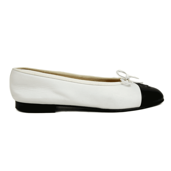 side view of Chanel White Leather Cap Toe Ballet Flats