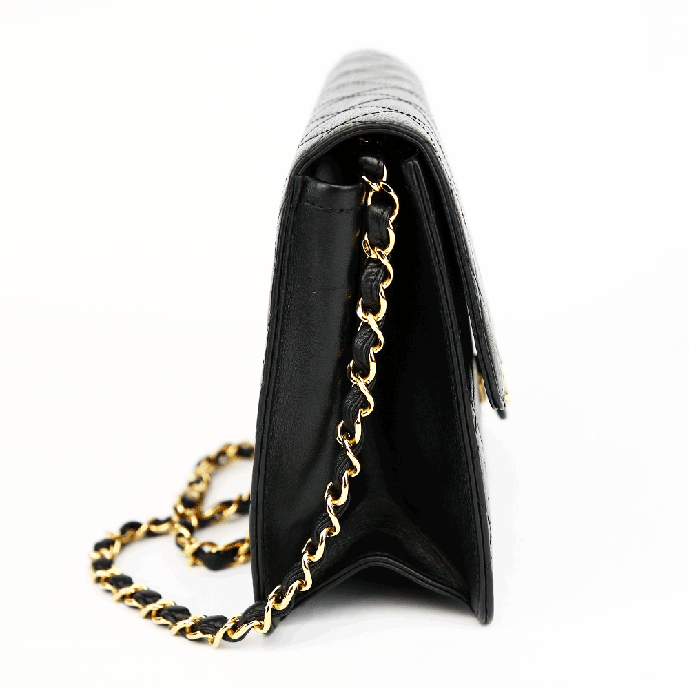 side view of Chanel Vintage Black Quilted Leather Single Flap Bag