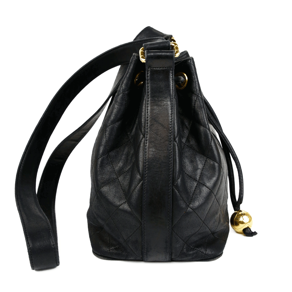 side view of Chanel Vintage Quilted Leather Drawstring Bucket Bag