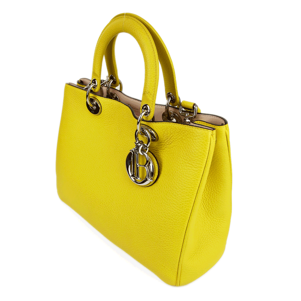 side view of Dior Yellow Pebbled Leather Diorissimo Tote Bag