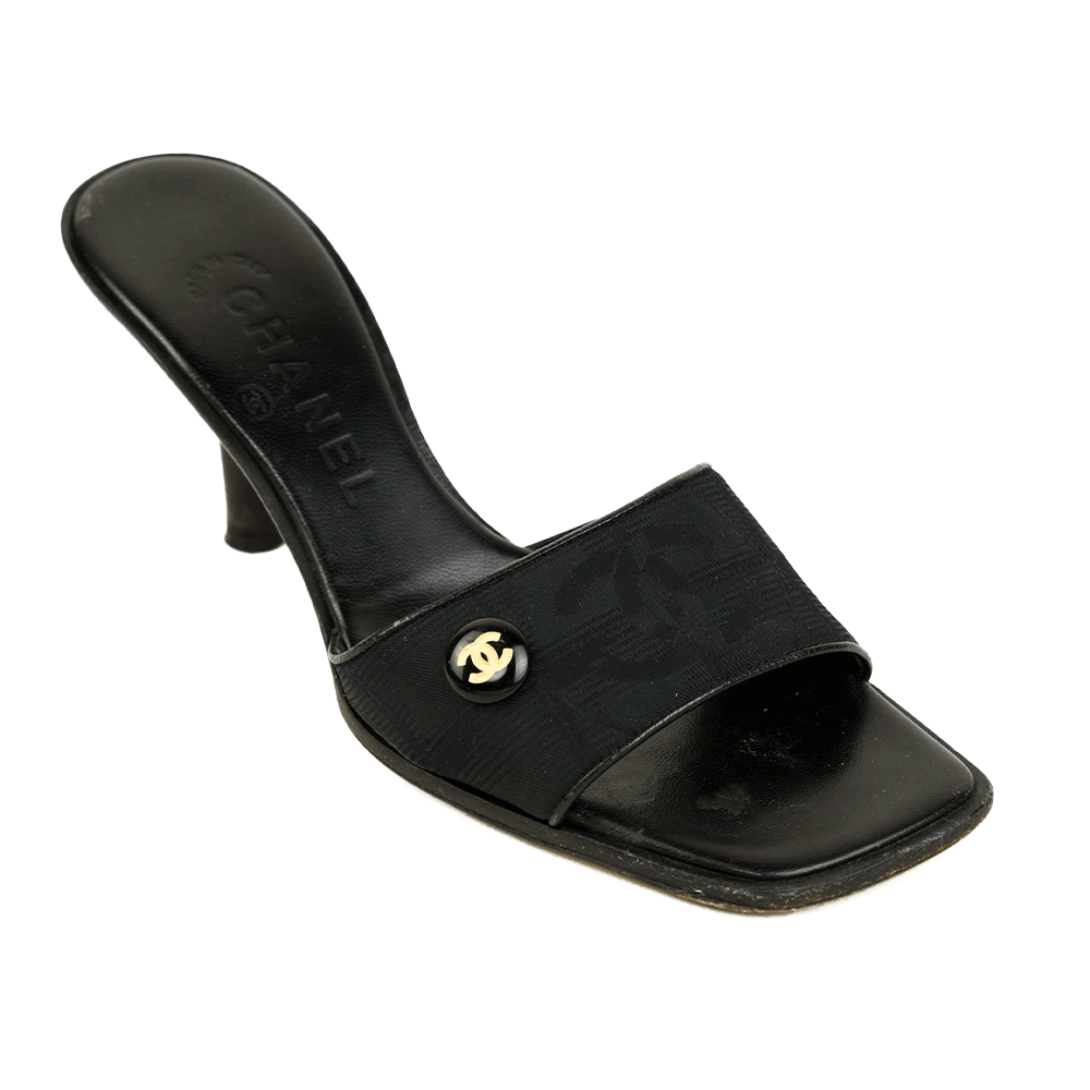 side view of Chanel Black Canvas CC Logo Slides