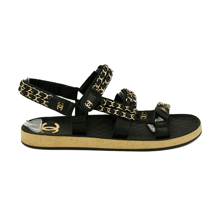 side view of Chanel Black Leather & Chain Flat Dad Sandals