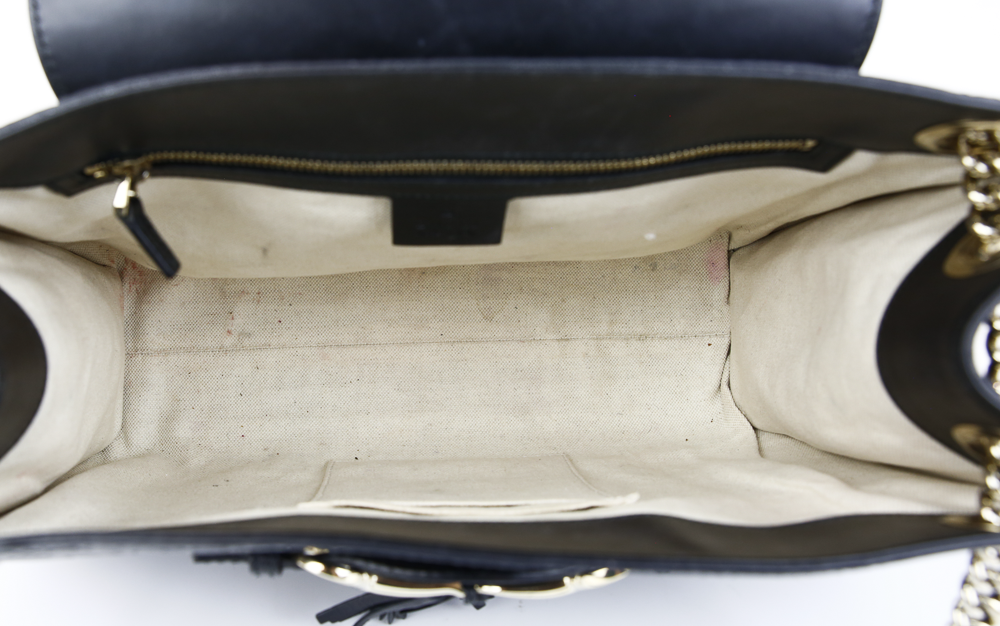 interior view of Gucci Black Micro Guccissima Medium Emily Shoulder Bag