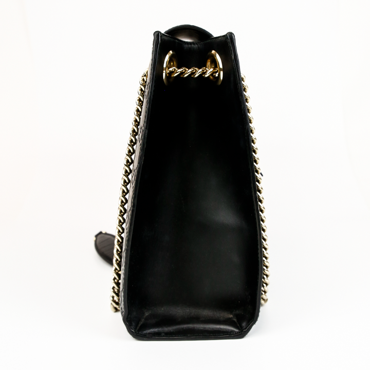 side view of  Gucci Black Micro Guccissima Medium Emily Shoulder Bag