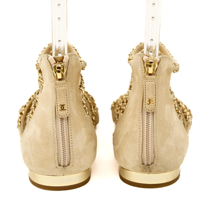 back view of Chanel Beige Kid Suede CC Chain Gladiator Sandals